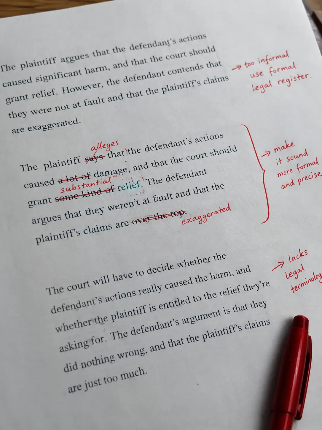 Handwritten corrections changing informal prose to formal legal register on a draft page